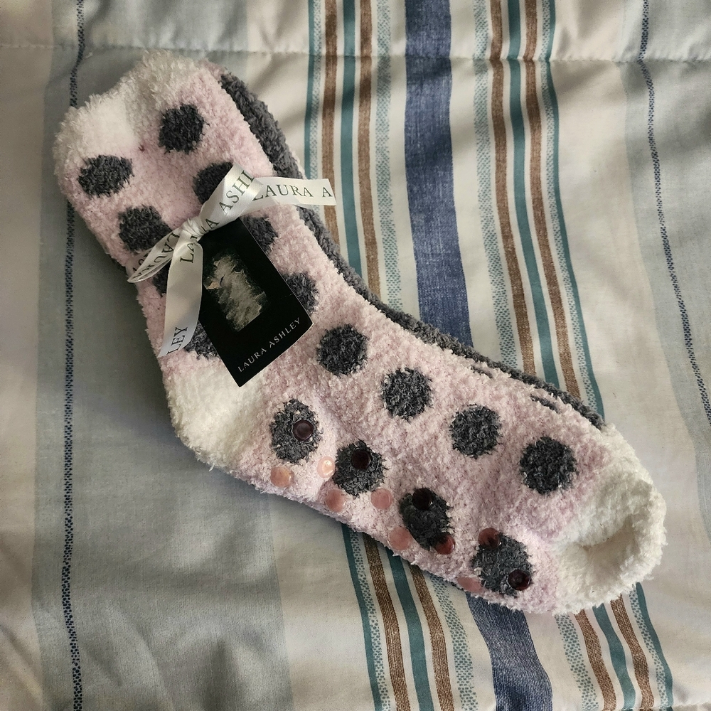 Three pair very soft plush socks with slide control.